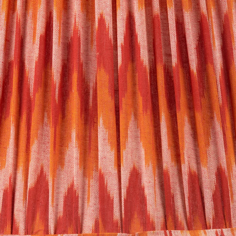 Corby Clear Glass Table Lamp Base with Suri 40 cm Pink and Orange Ikat Patterned Mushroom Pleat Tapered Lampshade